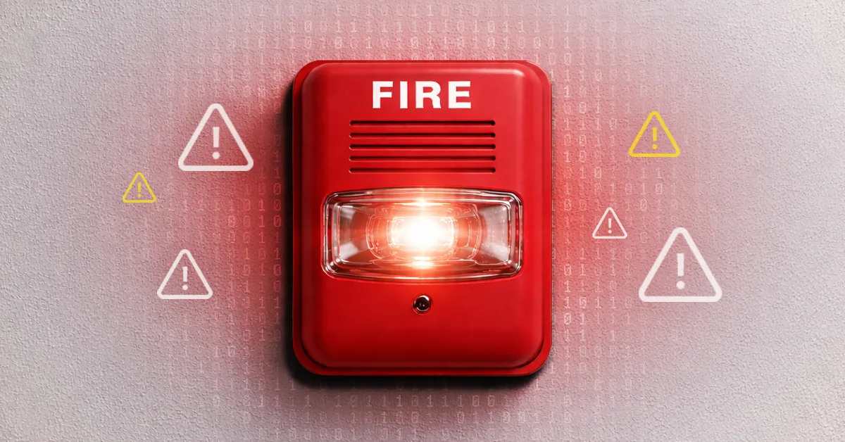 Red fire alarm with glowing light and warning symbols around it on a light background