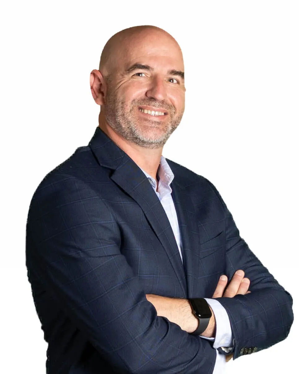 ceo-tommy-thornton-portrait Tommy Thornton, CEO of Automates, smiling in a navy blazer